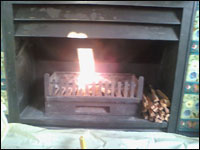 A kindling fire is enough to teat if the chimney is clear.